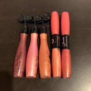 Vintage Too Faced glosses.